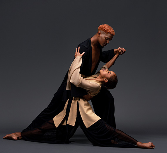 Two dancers from the Cleo Parker Robinson Dance Ensemble 