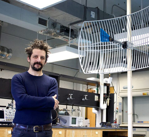 Steven Prohira standing in a laboratory