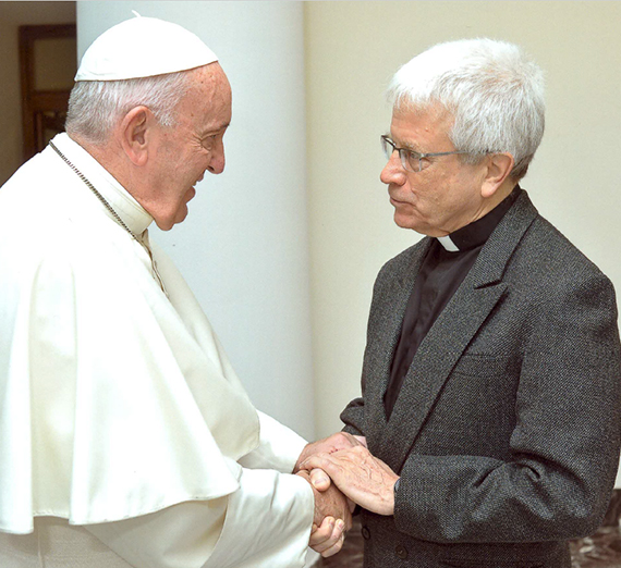 Pope Francis greets David Nazar, S.J., 