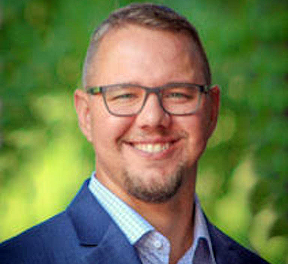 St. Ignatius statue located on Gonzaga University campus in autumn time
