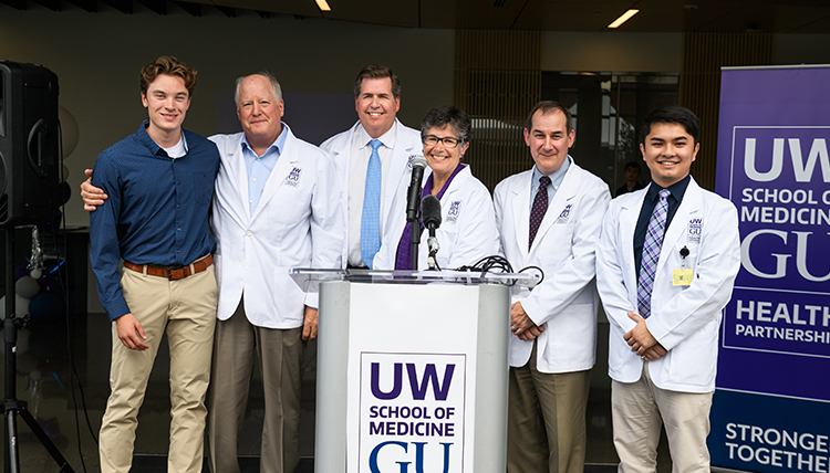 Students and administrators celebrate the opening of the UW-GU Health Partnerhsip building, September 7, 2022