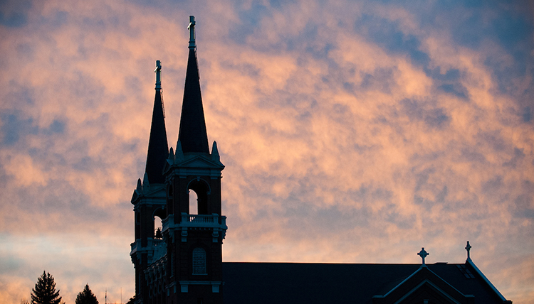 spires of St. Als at sunset