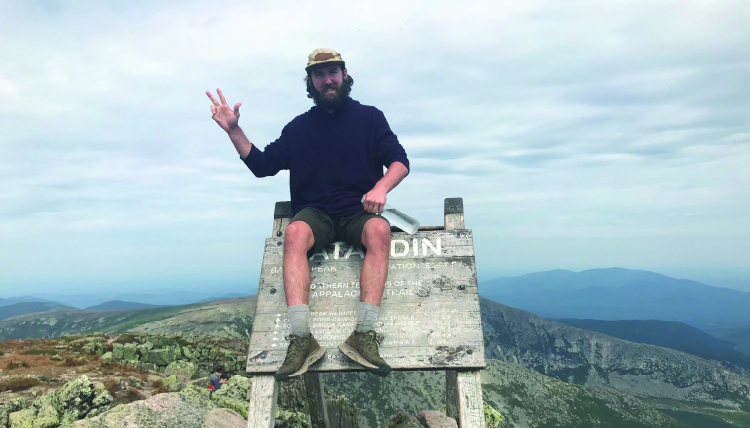 Eddie Jackie at the Summit of a Mountain