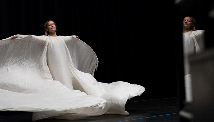 female dancer in historic flowing dance gown