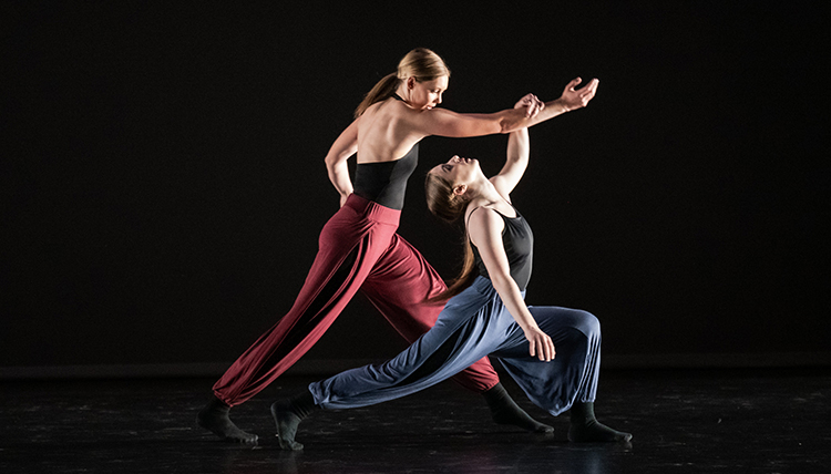 two dancers in dramatic pose