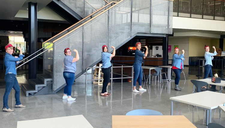 women lead staff delivering lunches