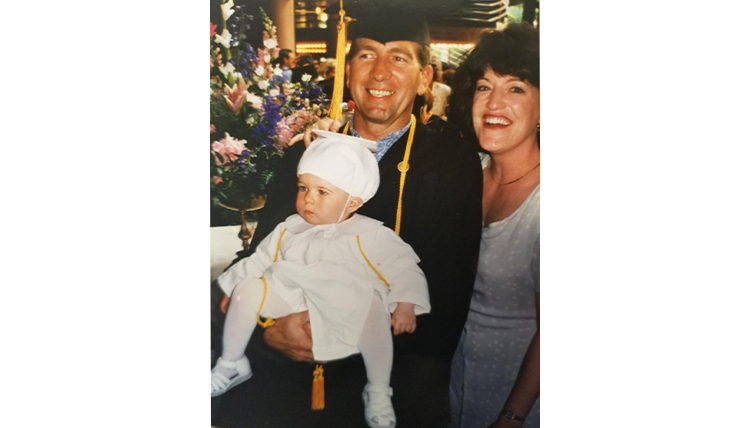 Melissa Keenan as a baby during her dad's nursing graduation