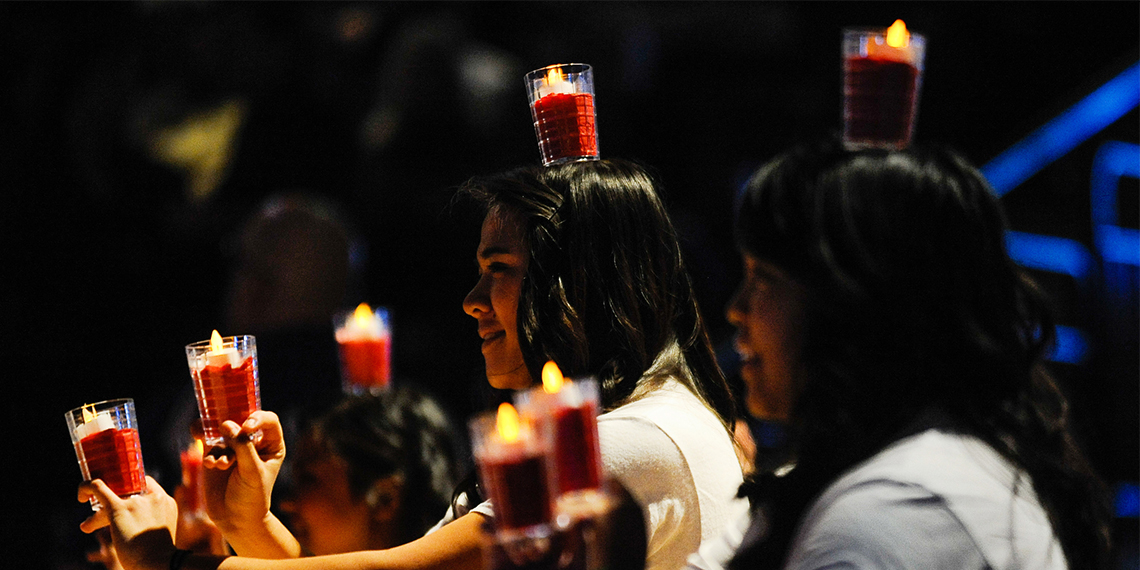 Asian students share cultural tradition with candles