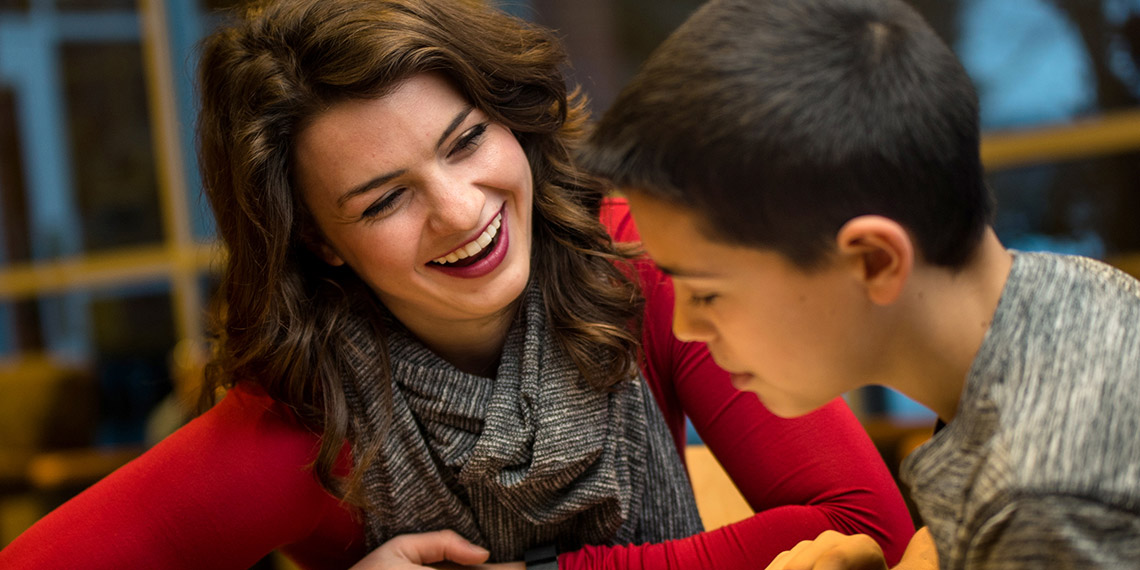 Gonzaga University student Madison Rose mentors a young boy with learning disabilities.