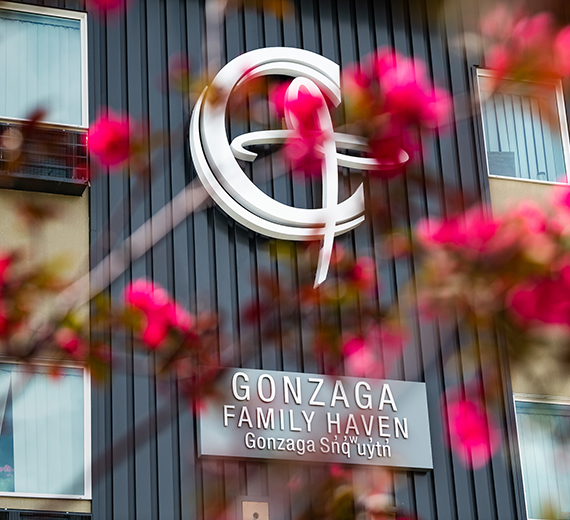 The Gonzaga Family Haven viewed through a blossoming tree. 