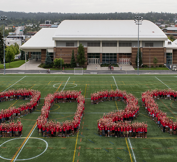 The class of 2020 forms the numbers "2020" on the field during their orientation in 2016.