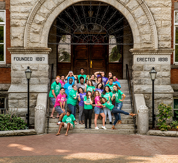 The leaders of DICE orientation pose outside college hall. 