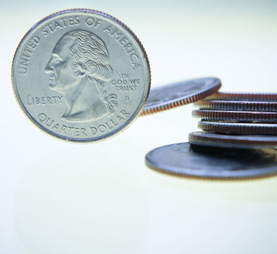 A stack of quarters is shown on a white background.  