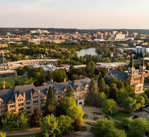 A drone shot of campus, with College Hall seen at the forefront.