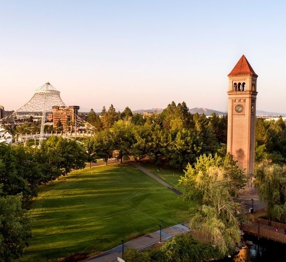 A photo of Riverfront Park, including the clock tower and the pavilion.