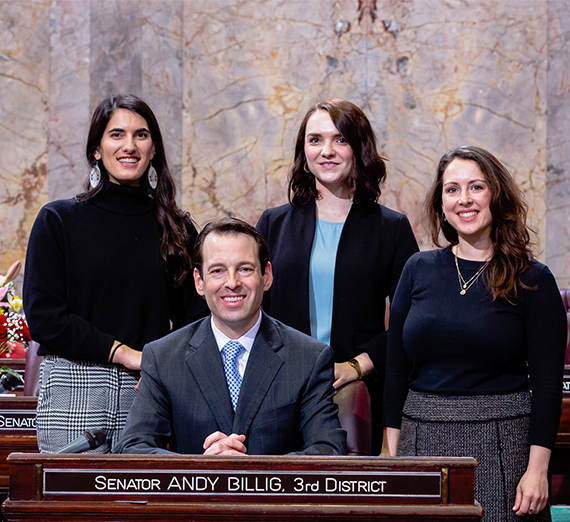 three female interns with Sen. Andy Billig