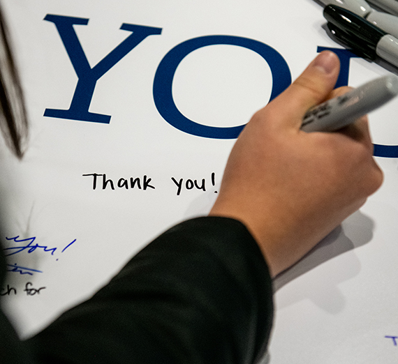 hand writing thank you with marker