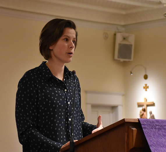 woman at podium in chapel