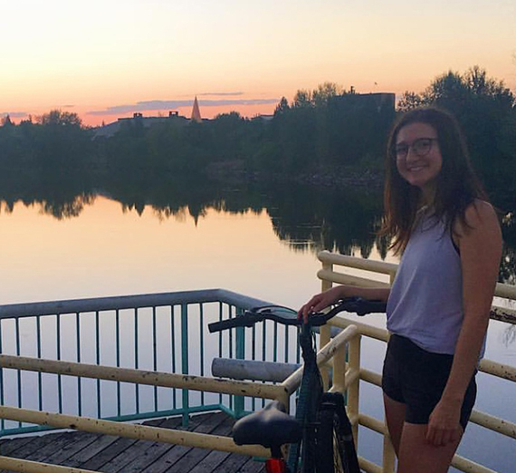 girl with bike on bridge