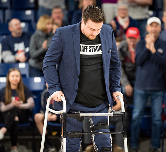 Mac McGraff walks on Senior Night.