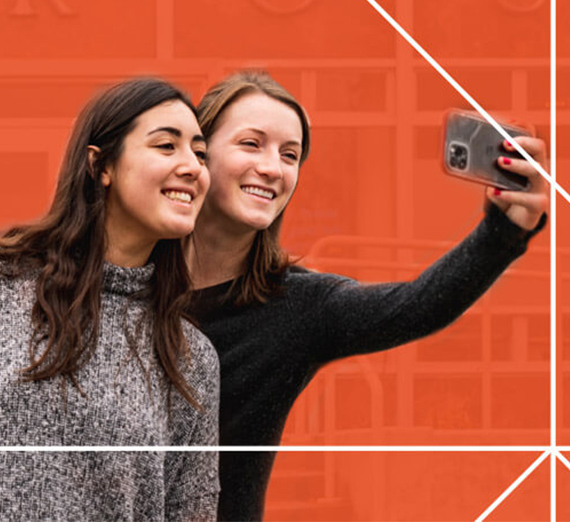 Two students take a selfie 