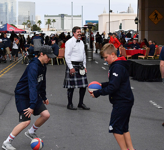 Thayne in kilt at WCC Rally. Courtesy of the Spokesman Review.