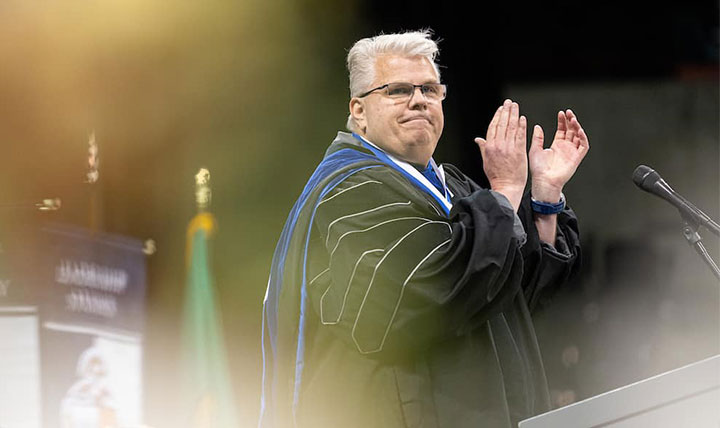 Robert McCann gave the commencement address and was awarded the DeSmet Medal.