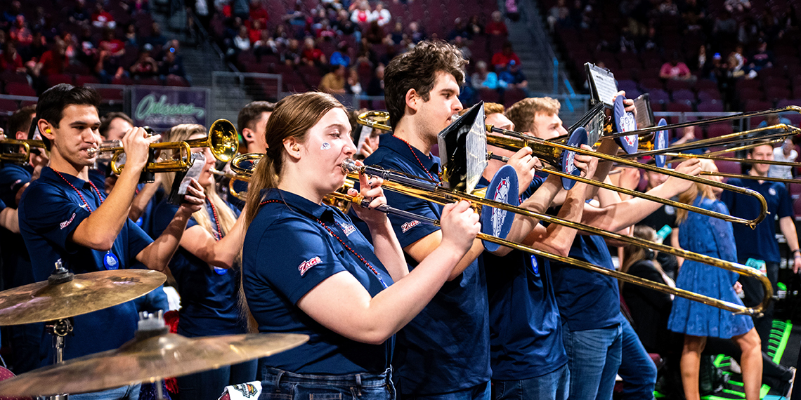 Group of students play wind instruments