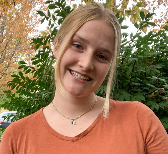 Ashley Painter looks into camera