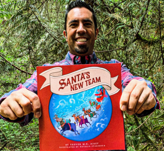 Trevor Airey '16 shows his new children's novel Santa's New Team 