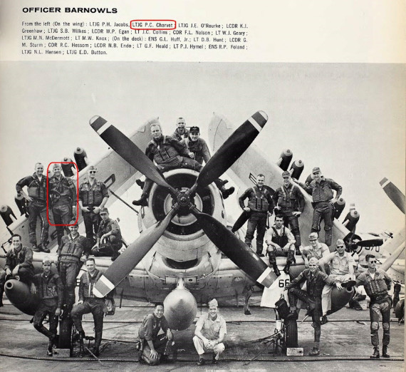 Group of Navy officers assembled in front of a plane