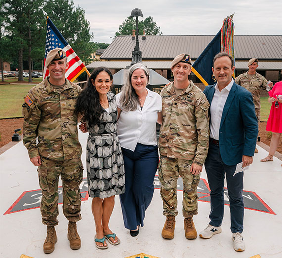 Brian Slamkowski and Jon Peterson with their families at the 3rd Ranger Battalion change of command ceremony.