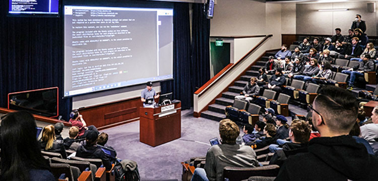 Cybersecurity professional talking at podium