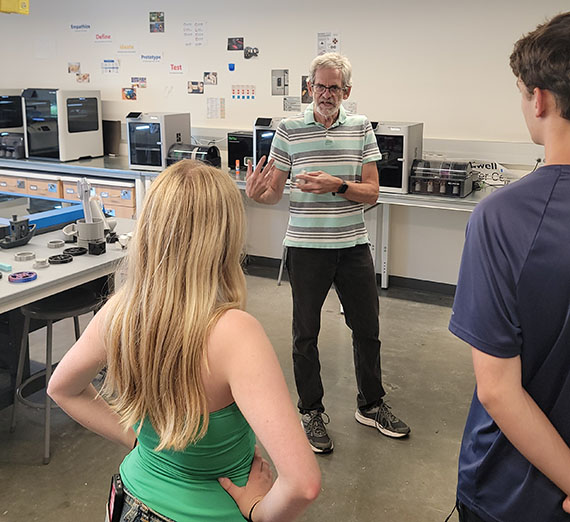 Two students with 3d printers