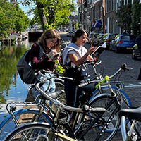 Students taking notes on different bike facilities they visited.