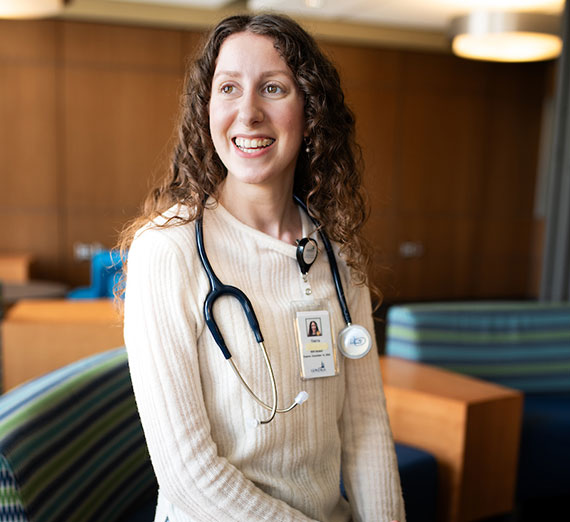 Sierra Martinsen stands with a stethoscope around her neck.