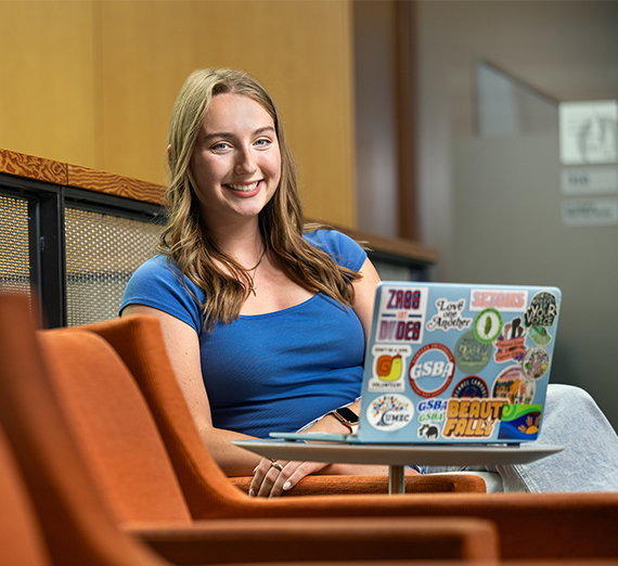 Ediger sits behind computer