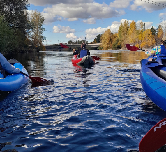 Students kayak down the Spokane river