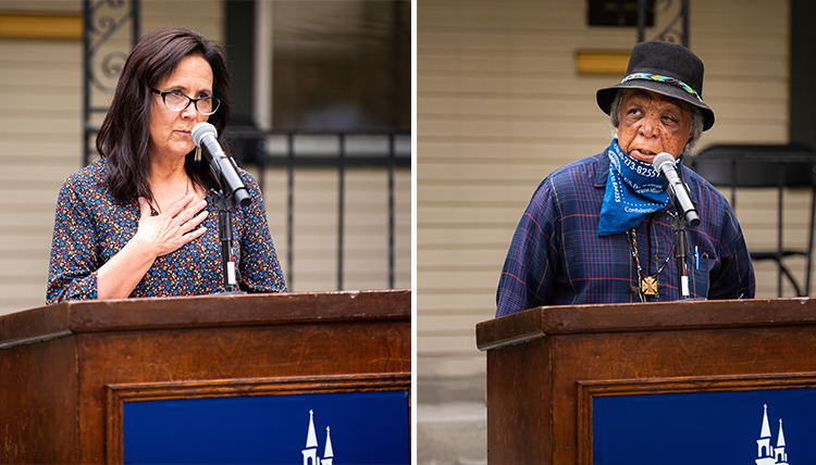 two native americans speak from podium