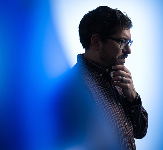 Headshots of four new faculty members