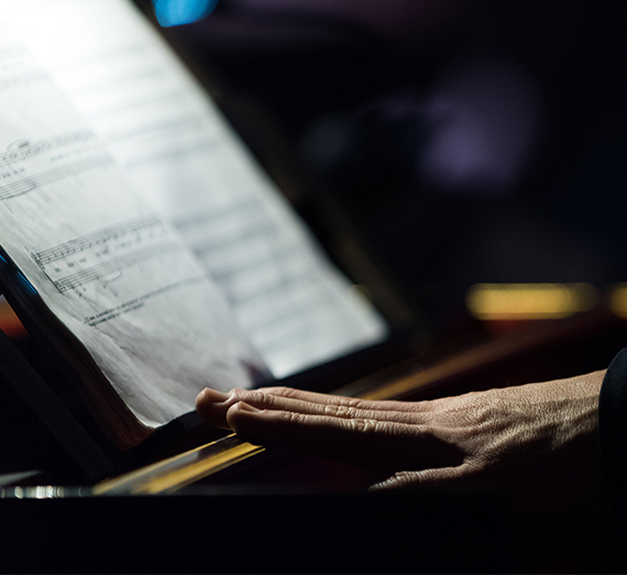 hand on sheet music