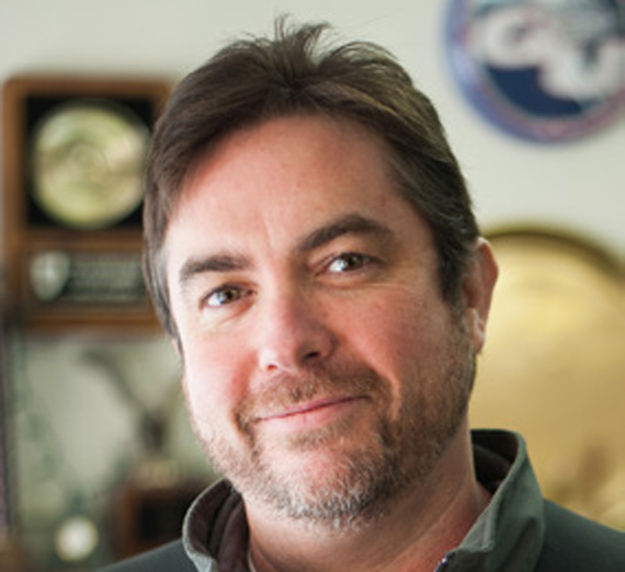 Headshot of debate coach Glen Frappier.