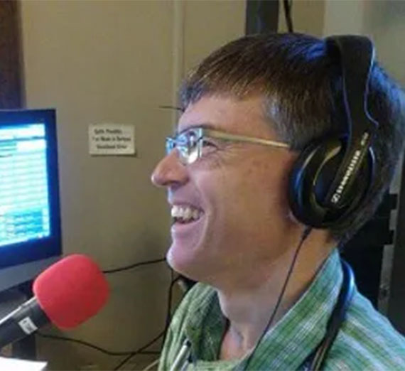 John Merril Steskal talking during his radio show.