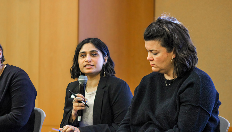 People speaking at an event.