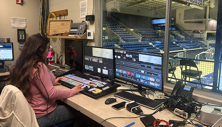 Person monitors a broadcast for Gonzaga.