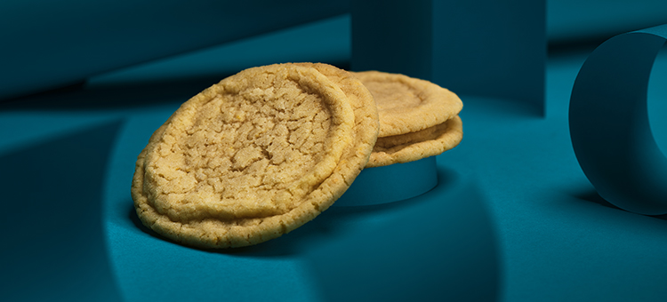 Lemon cookies on a blue background.