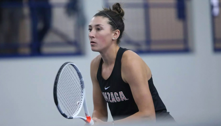 Woman playing tennis.