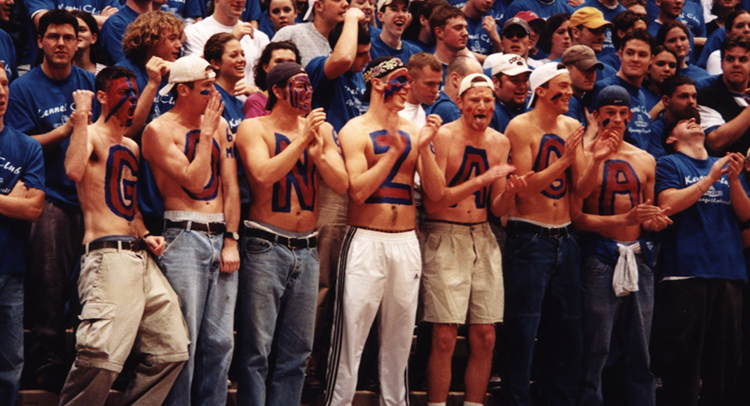 Group of Zag fans with painted chests.