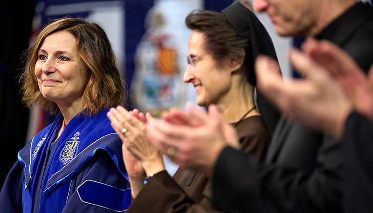 President Passerini smiling at her inauguration.
