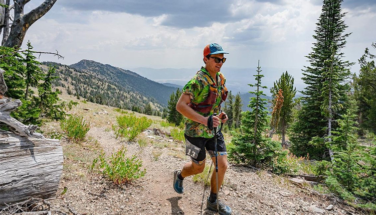 man running on mountain trail